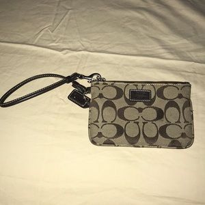 Canvas coach wristlet